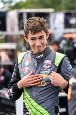 NTT INDYCAR SERIES sürücüsü, yedek sürücü, NOLAN SIEGEL (78) Palo Alto, Kaliforniya 'dan Elkhart Lake WI' deki Road America 'daki XPEL Grand Prix' den önce milli marşı temsil etmektedir..