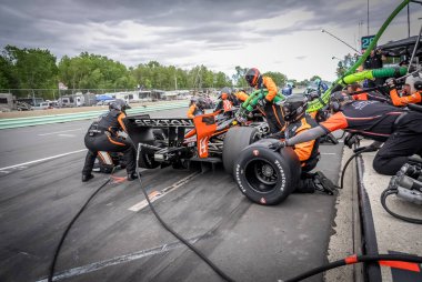 SANTINO FERRUCCI (14) Woodbury, Connecticut 'tan XPEL Grand Prix sırasında hizmet için Elkhart Gölü, WI..