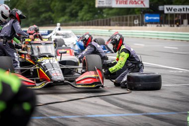 Miami, Florida 'dan PIETRO FITTIPALDI (30), WI. Dünya Savaşı' nda Elkhart Gölü 'ndeki Road America' da XPEL Grand Prix sırasında servis için pit yolundan geliyor..