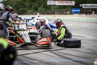 Miami, Florida 'dan PIETRO FITTIPALDI (30), WI. Dünya Savaşı' nda Elkhart Gölü 'ndeki Road America' da XPEL Grand Prix sırasında servis için pit yolundan geliyor..