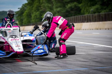 Felix Rosenqvist (60) of Varnamo, Sweden comes down pit road for service during the XPEL Grand Prix at Road America in Elkhart Lake, WI. clipart