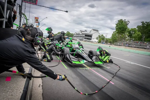 Cenevre, İsviçre 'den ROMAIN GROSJEAN (77), WI. Dünya Savaşı' nda Elkhart Gölü 'ndeki Road America' da XPEL Grand Prix sırasında servis için çukura gelir..