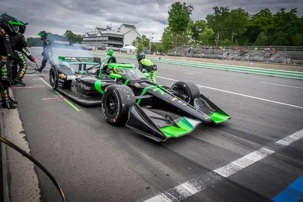 Cenevre, İsviçre 'den ROMAIN GROSJEAN (77), WI. Dünya Savaşı' nda Elkhart Gölü 'ndeki Road America' da XPEL Grand Prix sırasında servis için çukura gelir..