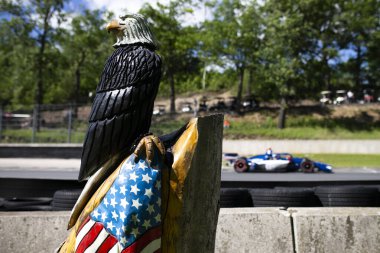 LINUS LUNDQVIST (R) (8) of Stockholm, Sweden drives on track during a practice session for the XPEL Grand Prix at the Road America in Elkhart Lake WI. clipart