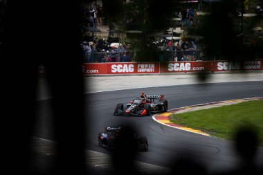 SANTINO FERRUCCI (14) of Woodbury, Connecticut drives on track during the XPEL Grand Prix at the Road America in Elkhart Lake WI. clipart