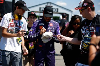 Bubba Wallace gets ready to practice for the The Great American Getaway 400 Presented by VISITPA.com in Long Pond, PA, USA clipart