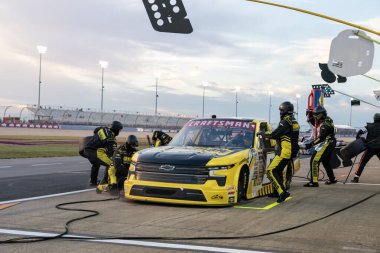 NASCAR Craftsman Truck Series driver, Grant Enfinger and crew make a pit stop for the Rackley Roofing 200 in Lebanon, TN, USA clipart