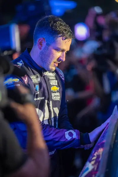 stock image NASCAR Cup Series driver, Alex Bowman celebrates his win for the Grant Park 165 in Chicago, IL, USA