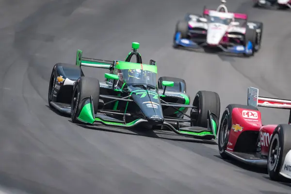 stock image NTT INDYCAR SERIES driver, ROMAIN GROSJEAN (77) of Geneva, Switzerland races through the turns during the Hy-Vee One Step 250 at Iowa Speedway in Newton, IA.