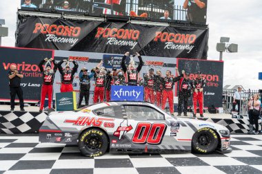 Cole Custer celebrates his win for the Explore The Pocono Mountains 225 in Long Pond, PA, USA clipart