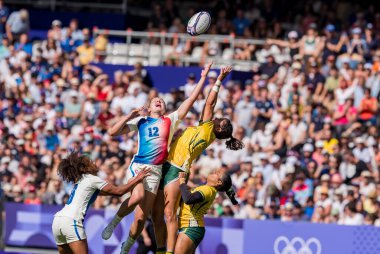 Team Brazil (BRA) plays Team France (FRA) in their Women's Rugby Seven Pool C match at the Sade de France Stadium during the 2024 Paris Summer Olympics in Paris, France. clipart