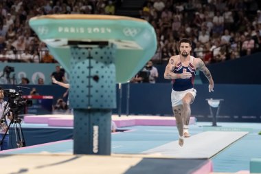 Casimir Schmidt (NED) of the Netherlands, competes in the Men's All-Around Finals at the Stade de France Stadium during the 2024 Paris Summer Olympics in Paris, France. clipart