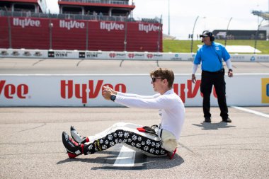 STING RAY ROBB (41) of Payette, Idaho suits up on the grid prior to qualifying for the Hy-Vee Homefront 250 at the Iowa Speedway in Newton IA. clipart