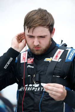 Aug 10, 2024-Richmond , VA;  KADEN HONEYCUTT walks pit road before qualifying for the Clean Harbors 250 in Richmond , VA, USA clipart