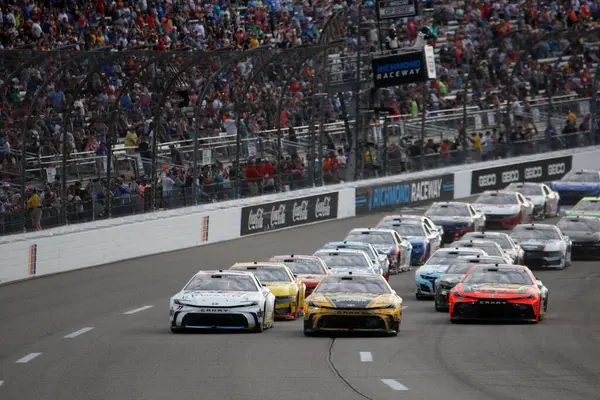 stock image Aug 11, 2024-Richmond , VA;  Denny Hamlin races down the front stretch for the Cook Out 400 in Richmond , VA, USA