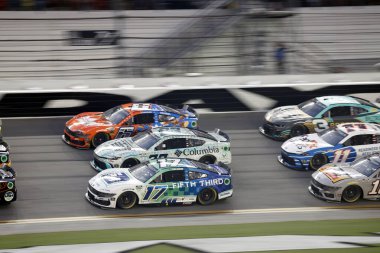 Aug 24, 2024-Daytona, FL;  Chris Buescher races off turn four during the Coke Zero Sugar 400 in Daytona, FL, USA clipart