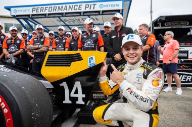 SANTINO FERRUCCI (14) (USA) of Woodbury, Connecticut and the A.J. Foyt Racing team celebrate after qualifying on pole position for the Bitnile.com Grand Prix of Portland at the Portland International Raceway in Portland OR. clipart