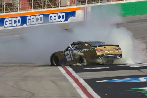 stock image NASCAR Xfinity Series driver,  AUSTIN HILL (21),  celebrates his win for the Focused Health 250 at Atlanta Motor Speedway in Hampton, GA.