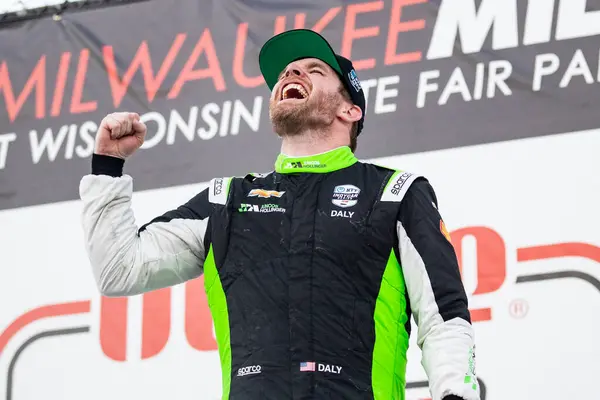 stock image CONOR DALY (78) (USA) of Noblesville, Indiana and the Juncos-Hollinger Racing team celebrate a podium finish in race one of the HyVee Milwaukee Mile 250s at the Milwaukee Mile in West Allis  WI.