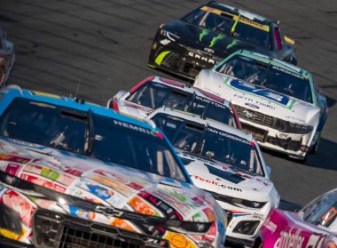 NASCAR Cup Series driver, SHANE VAN GISBERGEN (13) of Auckland, New Zealand (NZE), races through the turns during the Bank of America ROVAL 400 at Charlotte Motor Speedway Road Course in Concord, NC. clipart