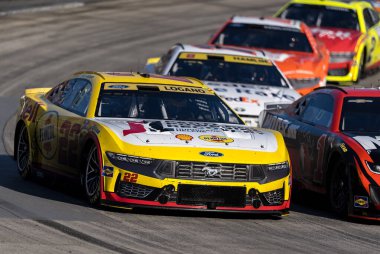 Nov 03, 2024-Ridgeway, VA;  NASCAR Cup Series driver, JOEY LOGANO (22) of Middletown, CT, races through the turns during the Xfinity 500 at Martinsville Speedway in Ridgeway, VA. clipart