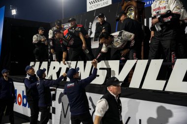 NASCAR Cup Series driver, RYAN BLANEY (12) of High Point, NC, celebrates his win for the Xfinity 500 at Martinsville Speedway in Ridgeway, VA. clipart