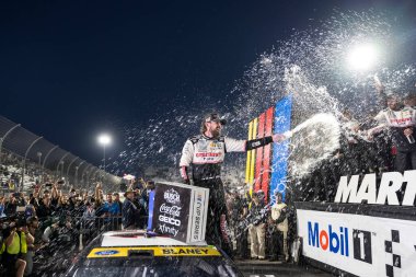 NASCAR Cup Series driver, RYAN BLANEY (12) of High Point, NC, celebrates his win for the Xfinity 500 at Martinsville Speedway in Ridgeway, VA. clipart