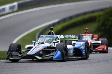CONOR DALY (76) (ABD) (Birmingham AL 'deki Berber Motorsporları Parkı' ndaki Alabama Indy Grand Prix 'si sırasında Alabama' nın Çocukları yarışları yolunda ilerliyor..