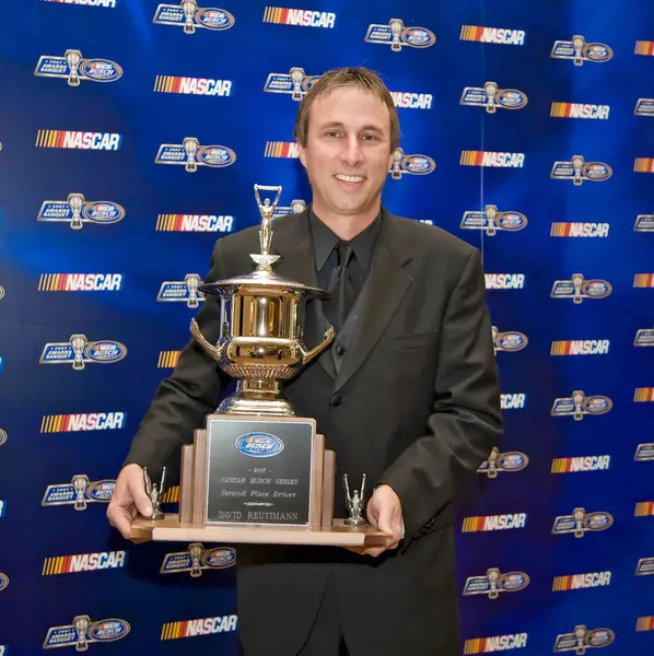 December 07, 2007 - Orlando, FL, USA: 2nd Place driver, David Reutimann, poses with his trophy at the Portofino Bay Hotel plays host to the NASCAR Busch Series Championship Banquet in Orlando, FL.
