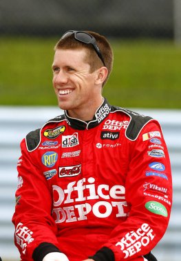 August 10, 2007 - Watkins Glen, NY, USA: Carl Edwards sits on the wall along pit road as he waits for the mist to subside at Watkins Glen.