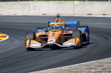NTT INDYCAR SERIES driver, SCOTT DIXON (9) (NZL) of Auckland, New Zealand, travels through the turns during a practice session for the XPEL Grand Prix at Road America in Elkhart Lake WI.