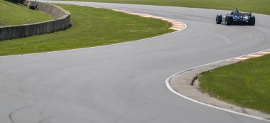 Elkhart Lake, WI USA - June 21, 2025:  NTT INDYCAR SERIES driver, DAVID MALUKAS (4) (USA) of Chicago, IL, travels through the turns during a practice session for the XPEL Grand Prix at Road America in Elkhart Lake WI.