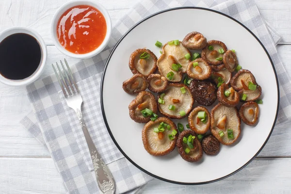 Hot Fried Shiitake Mushrooms Green Onions Spicy Sauces Close Wooden — Stock Photo, Image