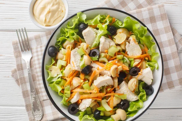 stock image Piedmont Style Chicken Salad with vegetables and mushrooms close-up in a bowl on the table. Horizontal top view from abov