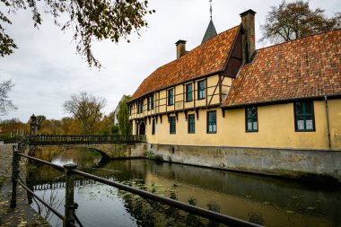 Outer bailey with gatehouse of the Burgsteinfurt moated castle in Steinfurt, Munsterland, North Rhine-Westphalia, Germany clipart