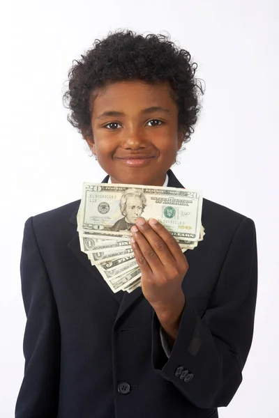 可爱的非洲裔美国男孩持有美元钞票 — 图库照片