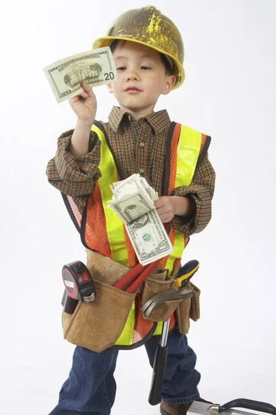 Pojke Utklädd Till Byggnadsarbetare Som Innehar Pengar — Stockfoto