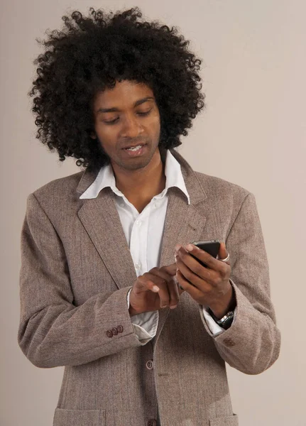 Young Businessman Using Cellphone Studio Shot — Stock Photo, Image