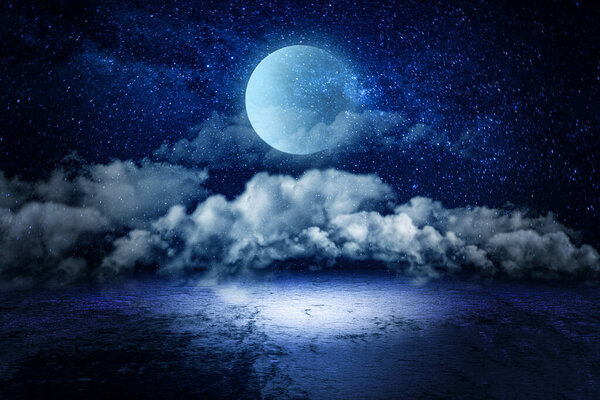 Full moon in the night sky. Clouds and empty place overlay perfect for compositing into your shots