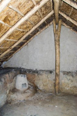 Furnace in the house of a reconstructed village from the Arpad Era in Tiszaalpar, in Hungary clipart