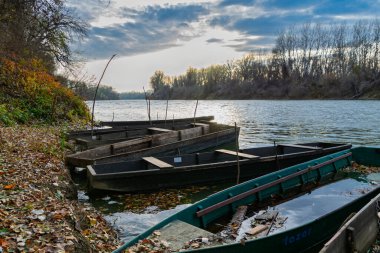 Boats in the beach of the Backwater of Tisza at Martely clipart