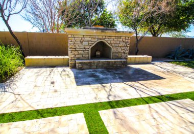 Large Stone Fireplace In Back Yaard