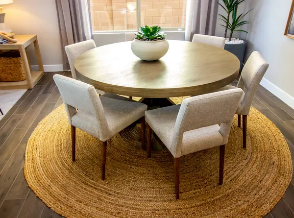 Circular Table With Five Padded Chairs