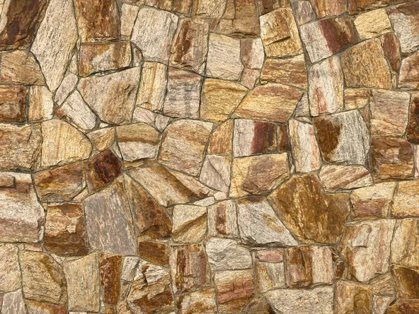Close up on the Stone wall texture. Background image.