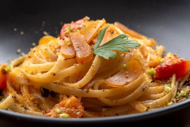 Delicious linguine with bottarga and tomatoes, italian pasta, mediterranean food clipart