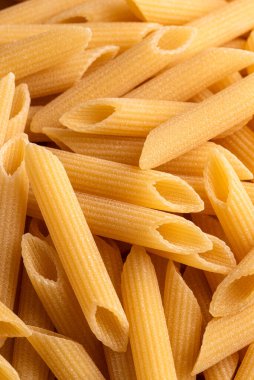 Çiğ makarna arkaplanı, kapat. Yiyecek. 