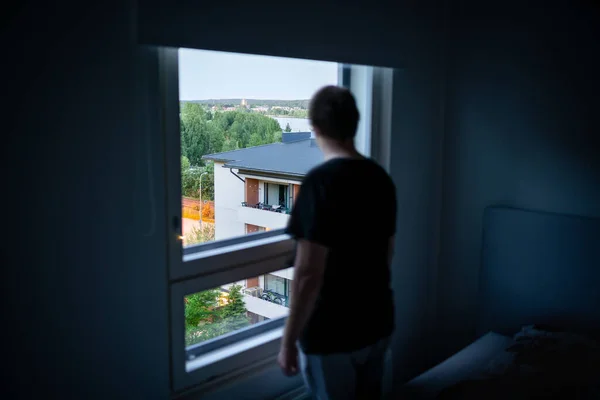 Man Window Dark Room Spying Neighbor Snooping Loneliness Shame Melancholy — Stock Photo, Image