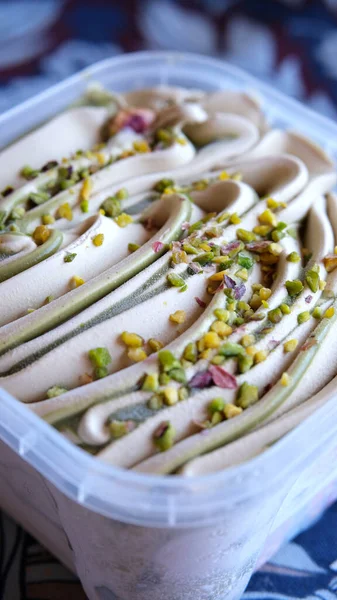 Industrial Hazelnut Flavored Ice Cream Chopped Pistachios Closeup Stock Picture