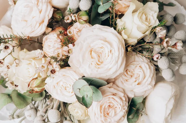 stock image Flower design and floristry. Beautiful delicate flowers bouquet background made with ranunculus, peony rose, brunia, rose and eucalyptus.