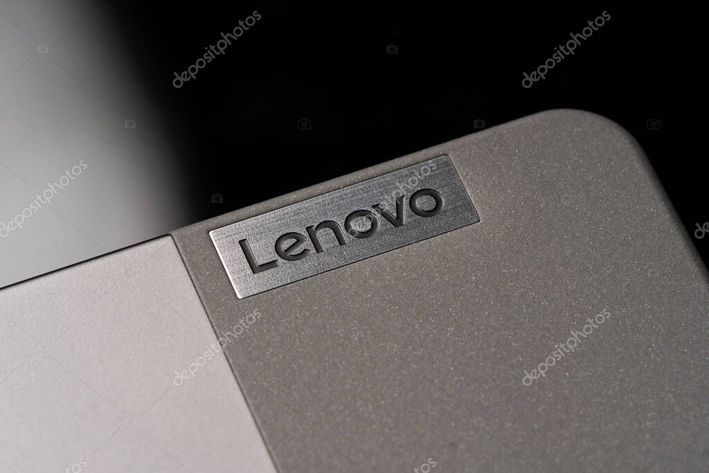 Illustrative editorial Lenovo logo on device surface. Lenovo is a Chinese multinational corporation that manufactures personal computers and other electronics. KHARKIV, UKRAINE - October 30, 2023.